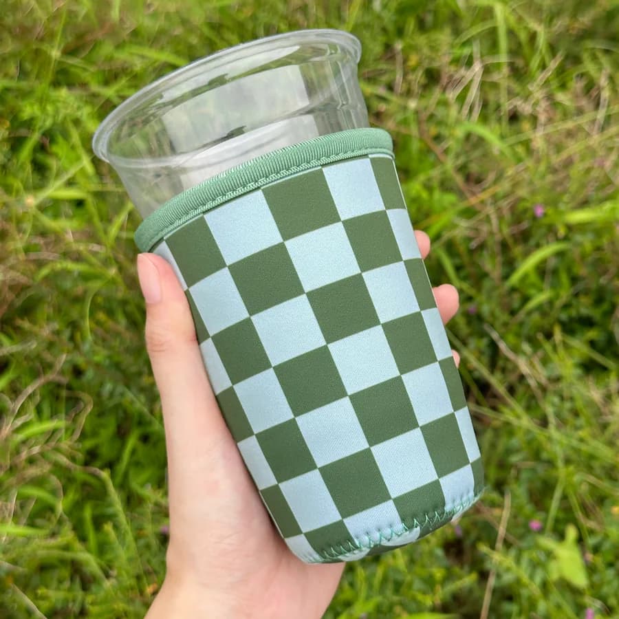 Green checkerboard neoprene coffee sleeve with a closed bottom